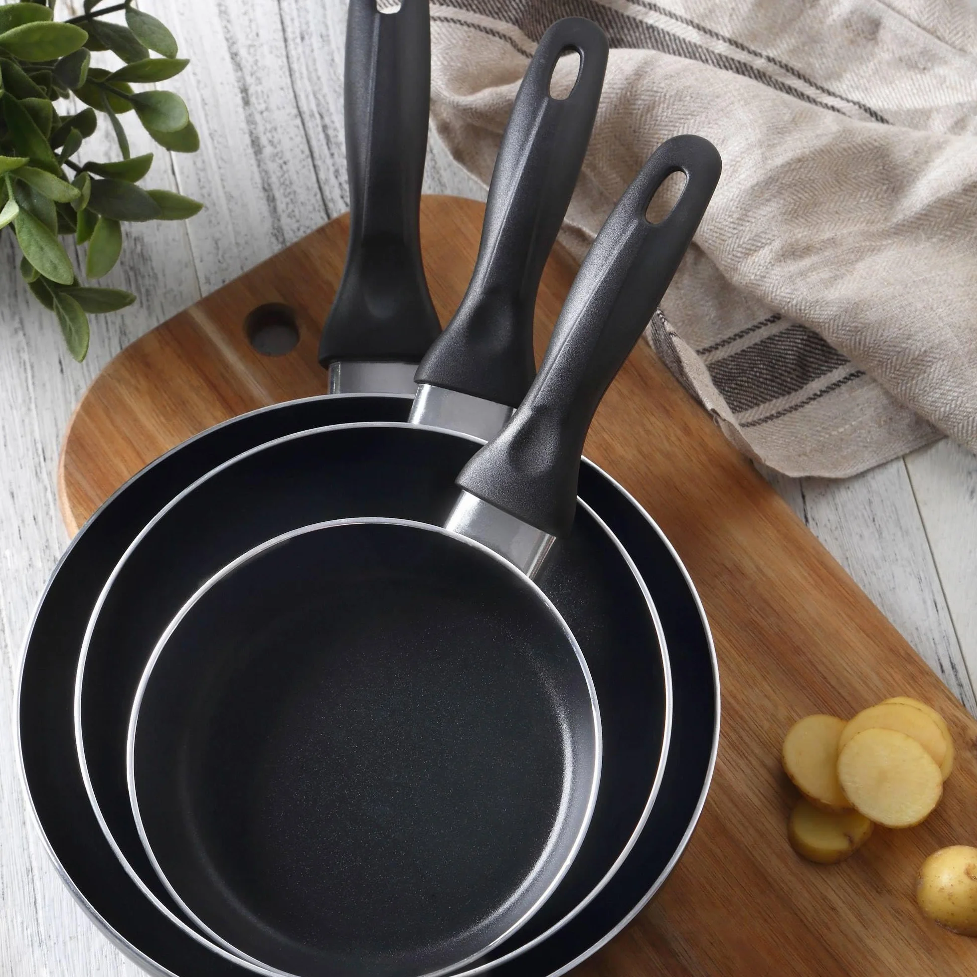 Bistro Series Set Batería de Cocina 7pc Acero Inoxidable + 3 Sartenes Negro Aluminio Prensado