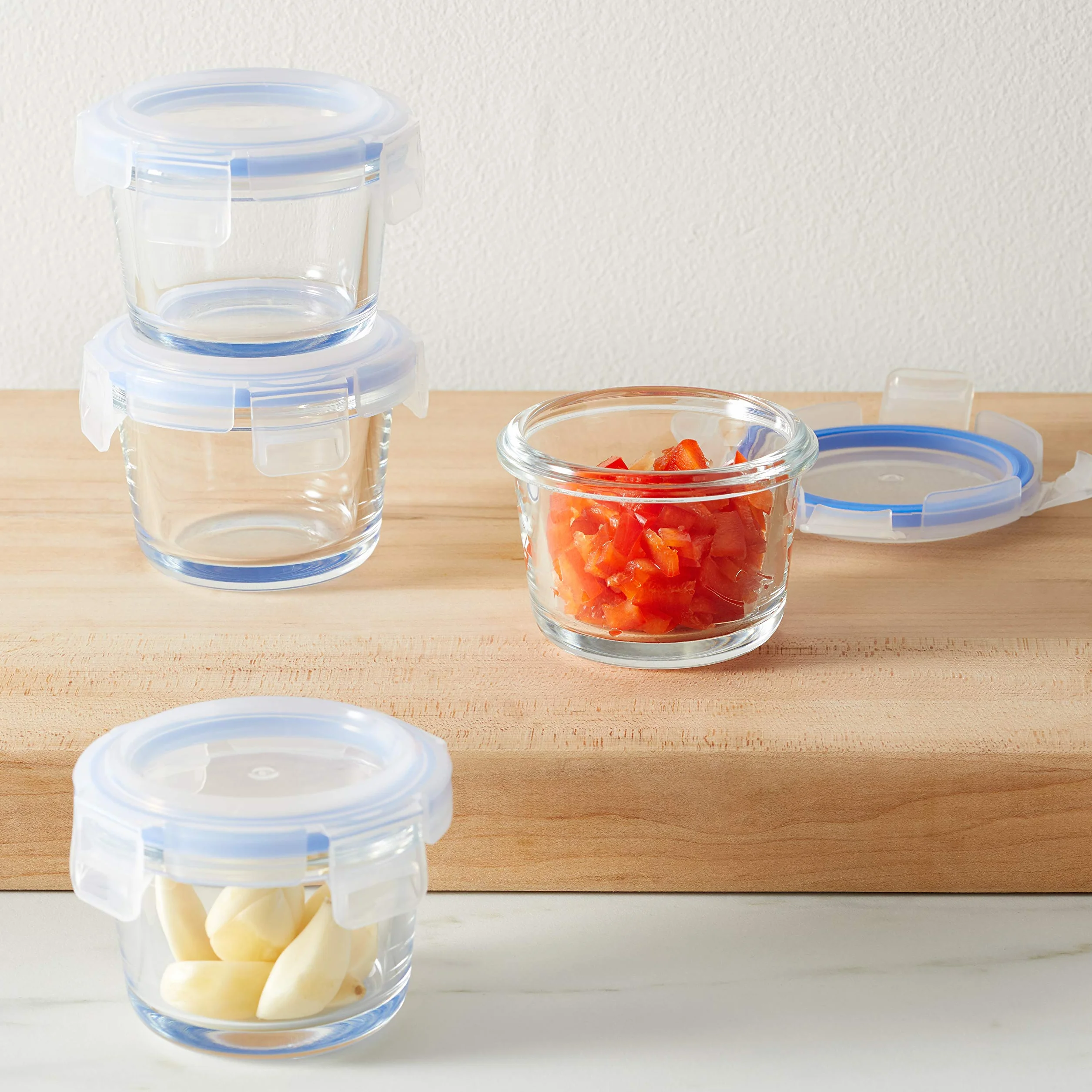 Amazon Basics ABL001 Pojemnik szklany przezroczysty z niebieską pokrywką 120 ml, 4 sztuki