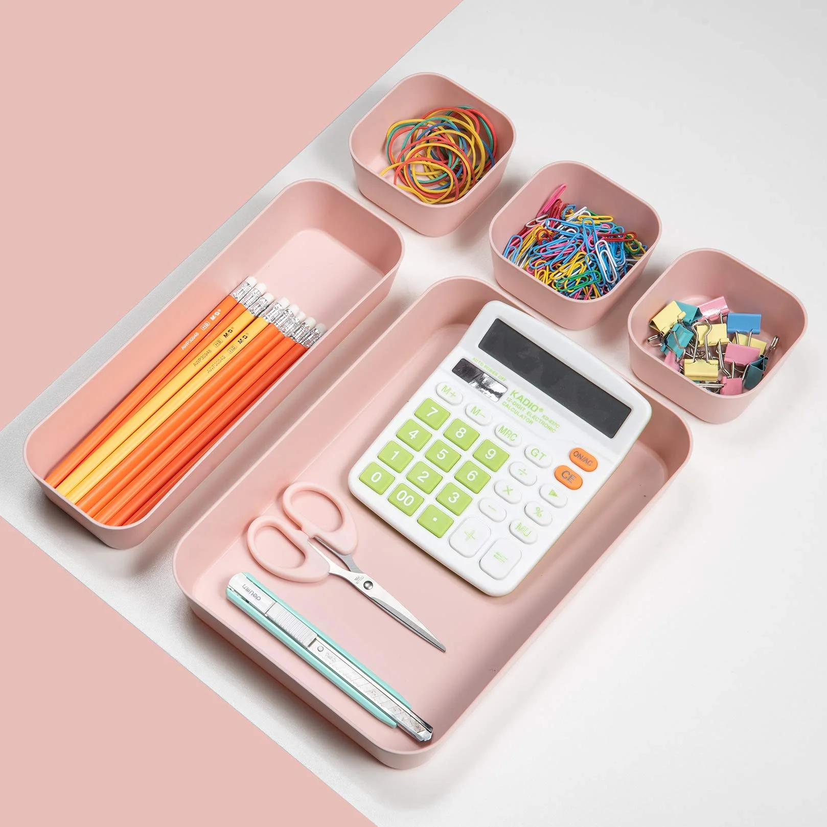 Juego de 12 organizadores de cajones de plástico rosa para maquillaje y oficina